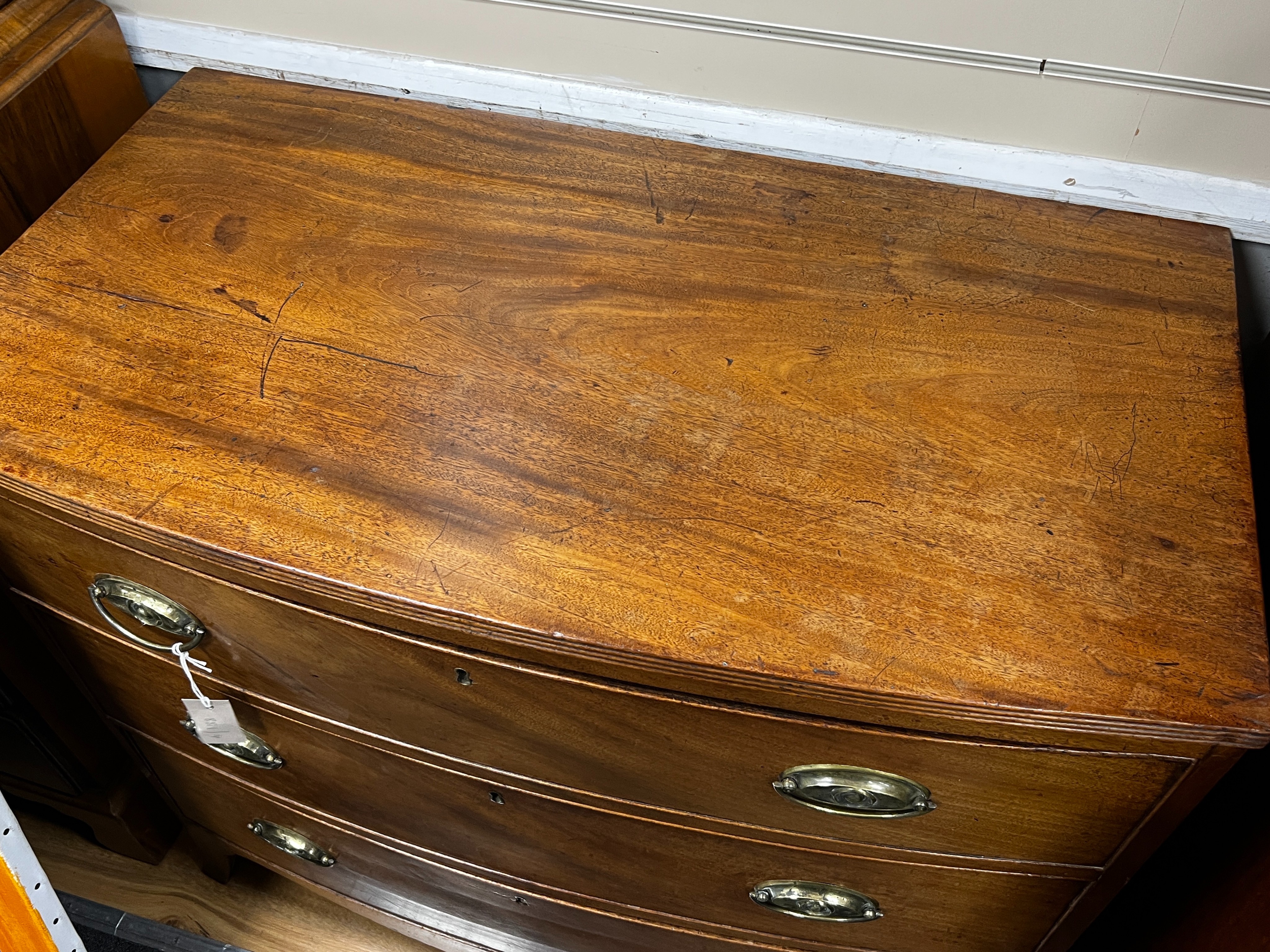 A Regency mahogany bowfront three drawer chest, width 92cm, depth 51cm, height 85cm
